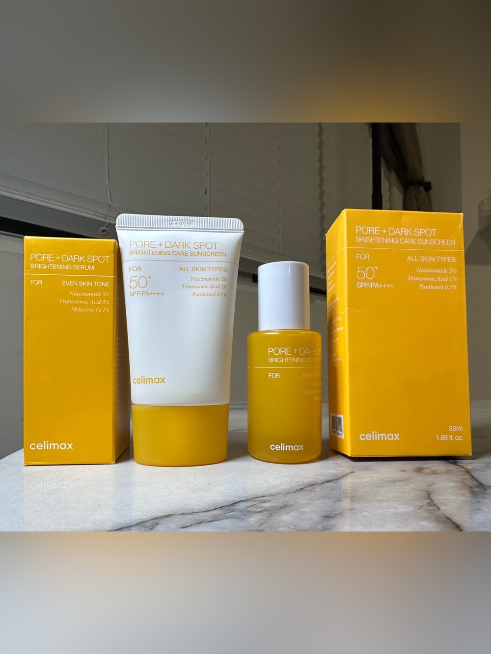 Brightening sunscreen & serum that will target pores and dark spots.